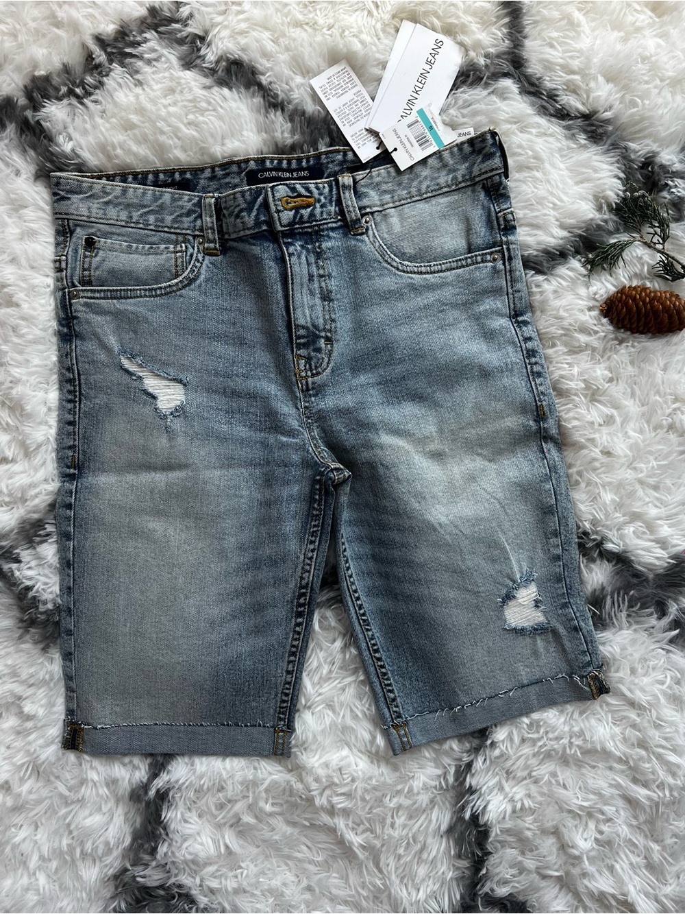 Calvin Klein Jeans light blue distressed denim Bermuda shorts